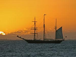 photo of sailing sunset